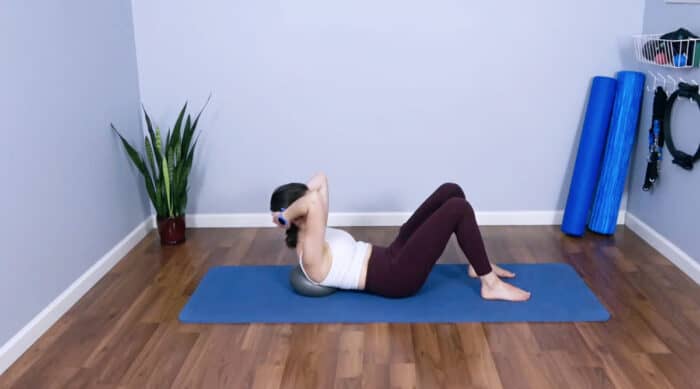 Pilates chest lift with soft ball core exercises